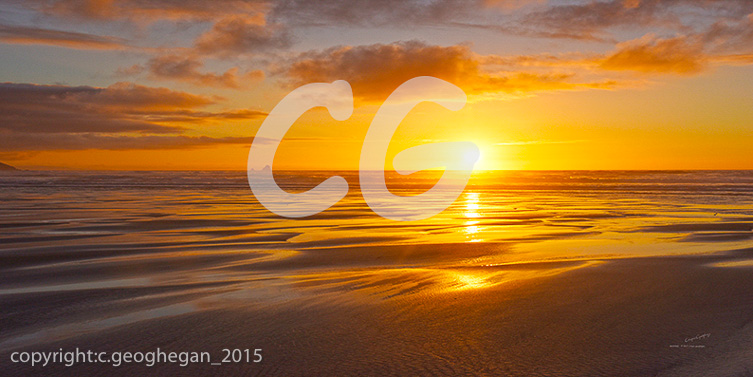 Going to Gold, setting sun on Perranporth Beach